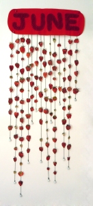 "Harvesting the Strawberry in the Midwest", 35 x 14 inches, watercolor on paper, string, fabric, 2012.  Image courtesy of Kim Guare. 